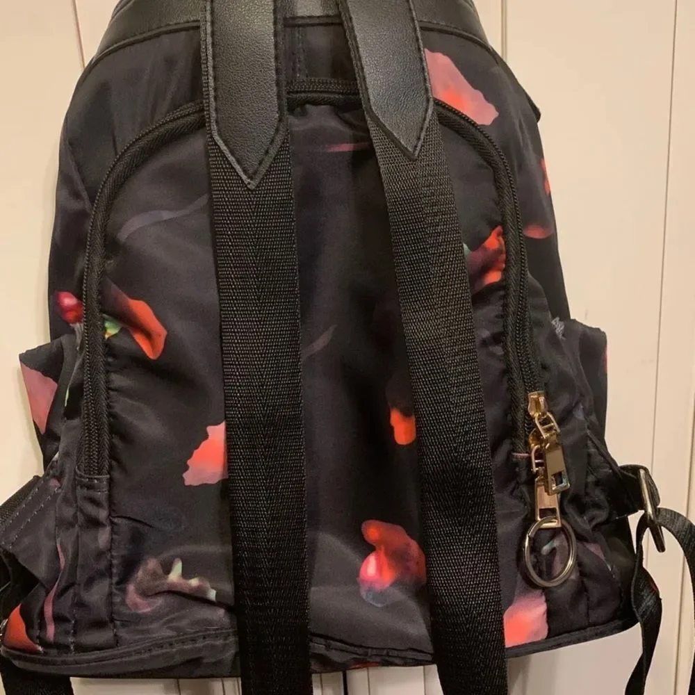 classic backpack and shoulder bag with antitheft design, abstract colors